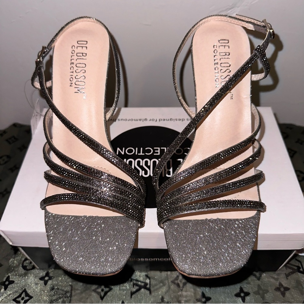 BRAND NEW! NEVER WORN! Strap Heels size 6.5